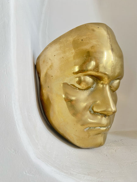 Applique visage laiton