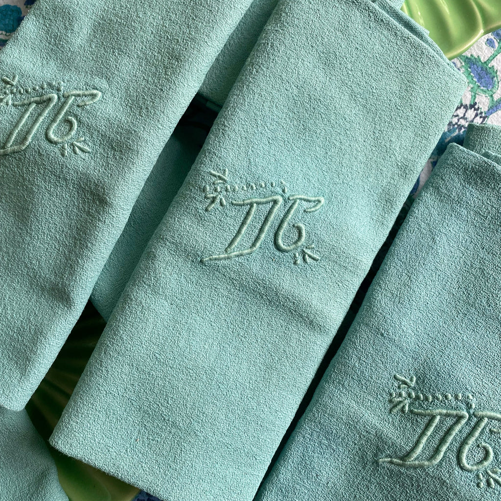 7 serviettes brodées