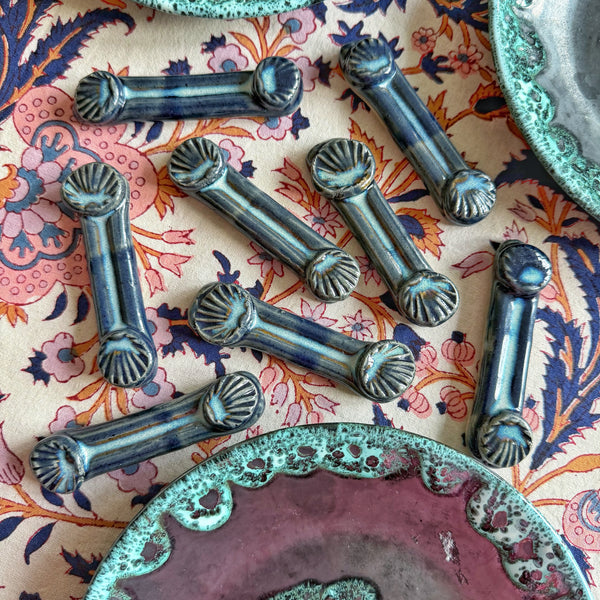 8 porte couteaux coquilles