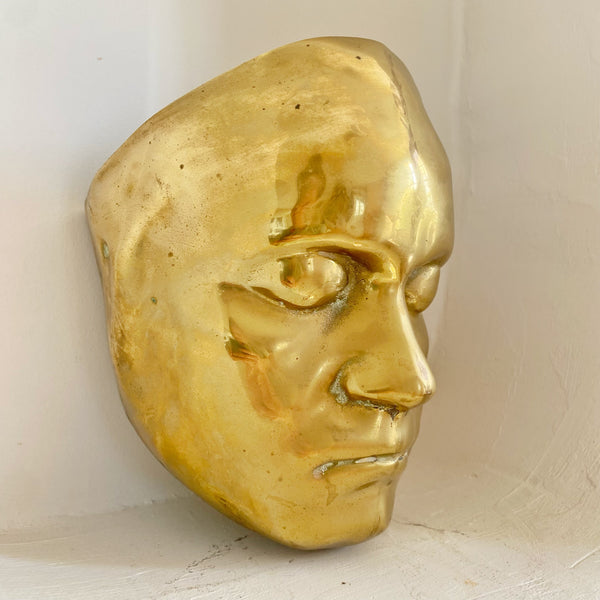 Applique visage laiton