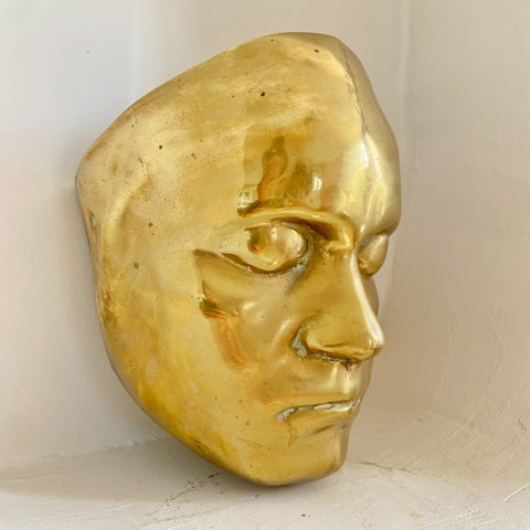 Applique visage laiton